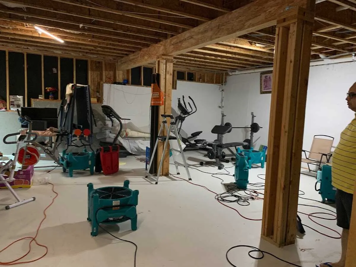 Basement drying equipment setup for Contents Cleaning & Restoration in Clinton
